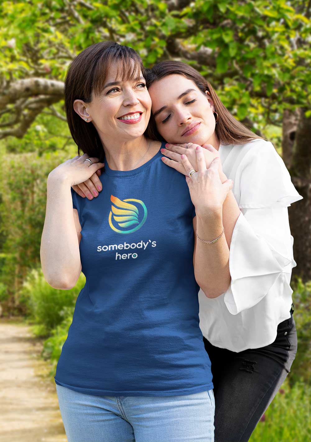 a mom wearing a somebodys hero tee shirt