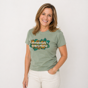 woman wearing somebody's everything t-shirt