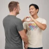 Couple forming heart with hands